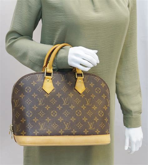 louis vuitton alma monogram bag.